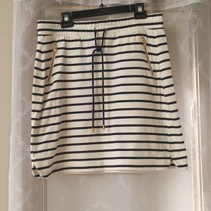 Holly Whyte Cream Skirt With Navy Blue Stripes. Pockets With Gold Zipper.